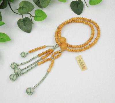 日蓮宗 本式数珠　つげ/拓植 (素挽)　8寸 (平玉)　小田巻梵天房 (房色:青磁ふちどり) 京念珠